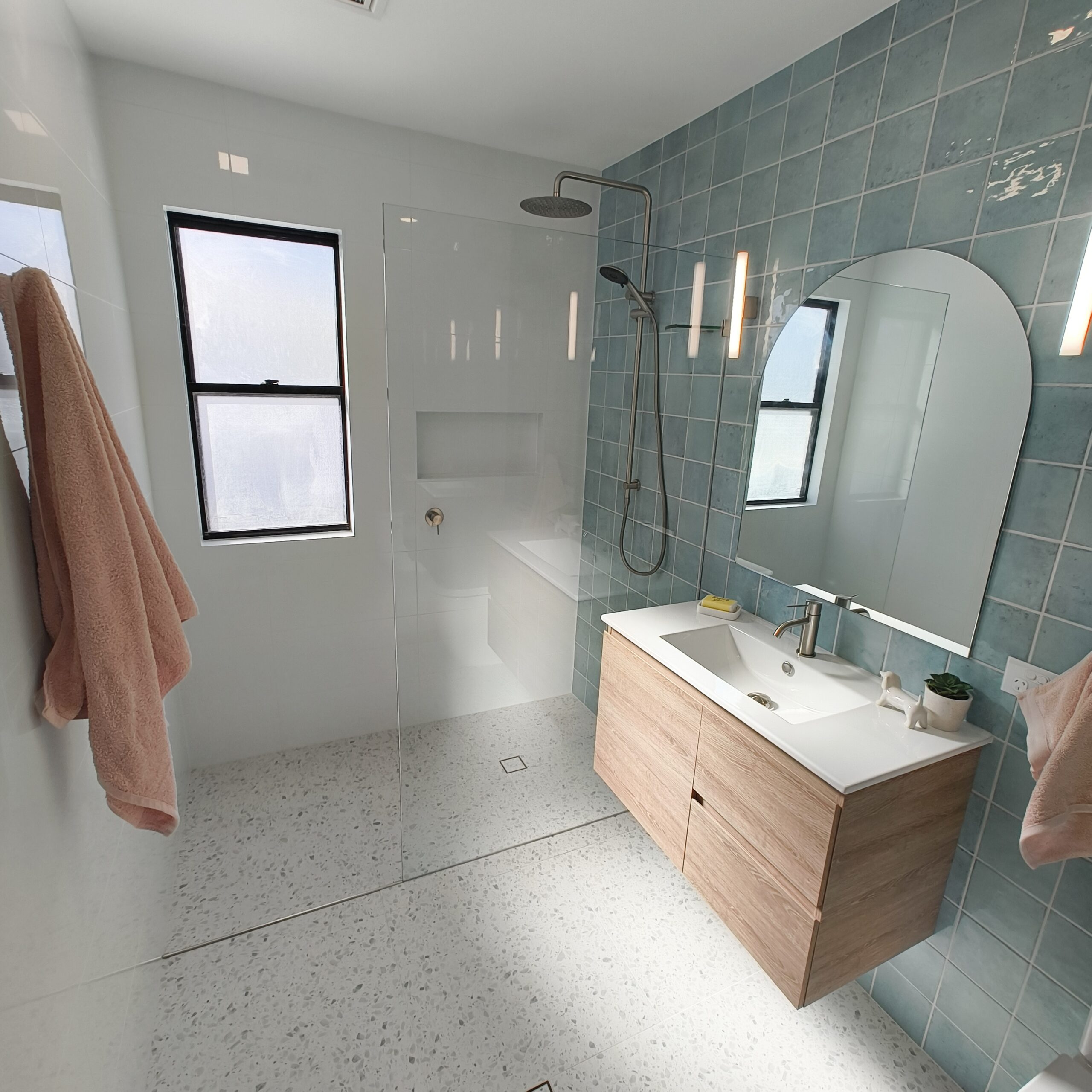 Yeerongpilly main bathroom renovation with blue feature wall and brushed nickel fixtures