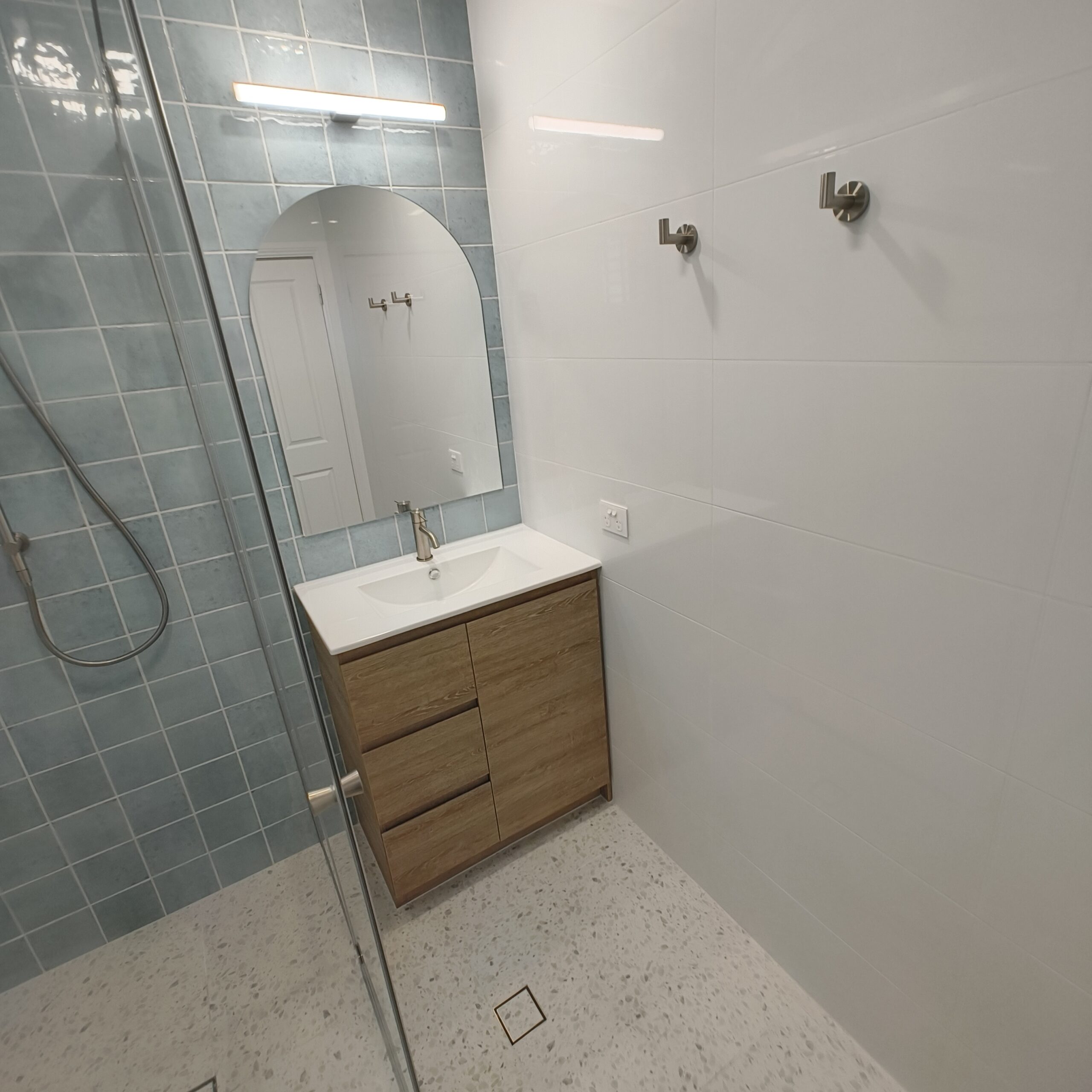 Yeerongpilly ensuite renovation with feature tile wall and updated shower