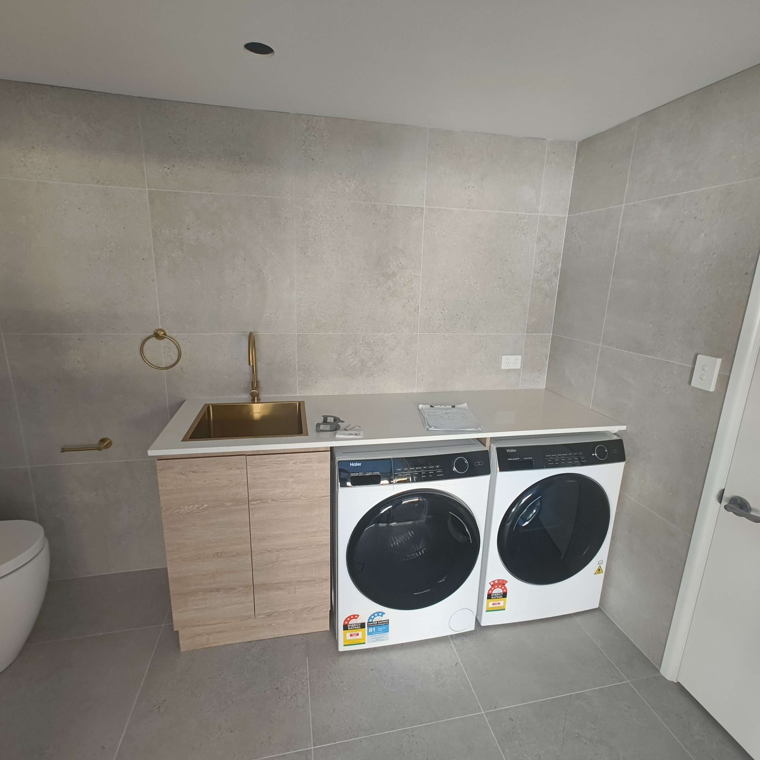Salisbury laundry conversion after renovation with shower and laundry bench