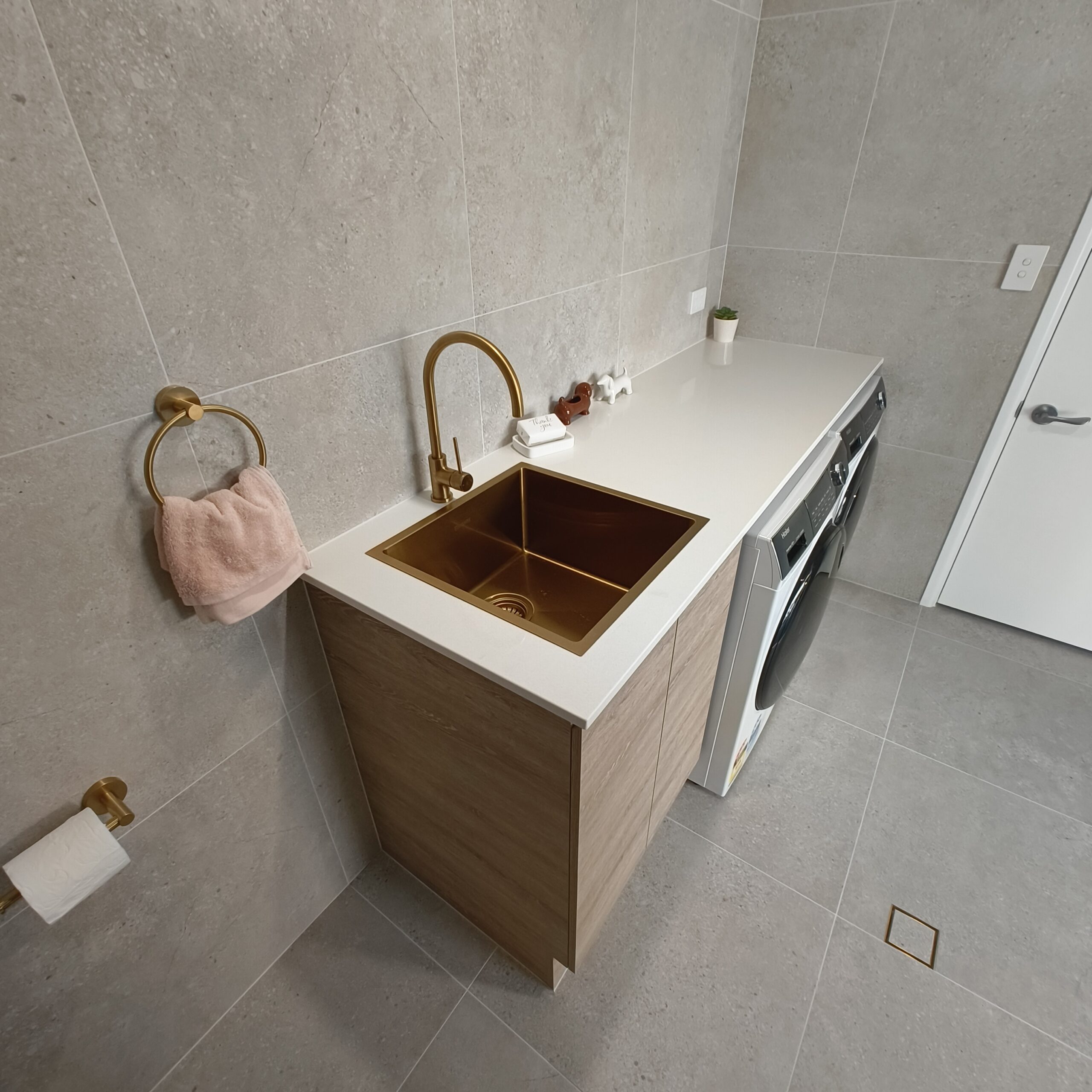 Salisbury second bathroom and laundry conversion with brushed brass fixtures