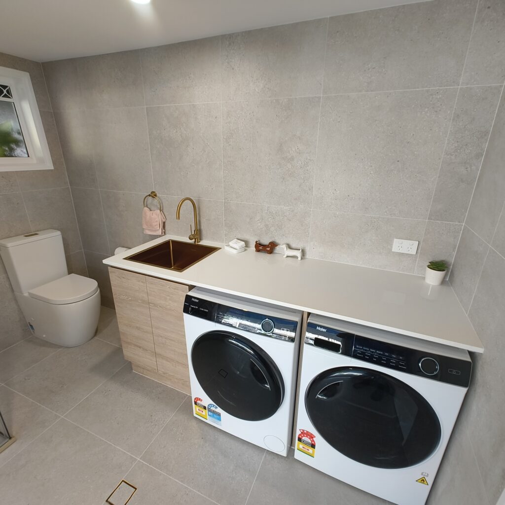 Completed Salisbury laundry renovation showing shower and streamlined tiled finish
