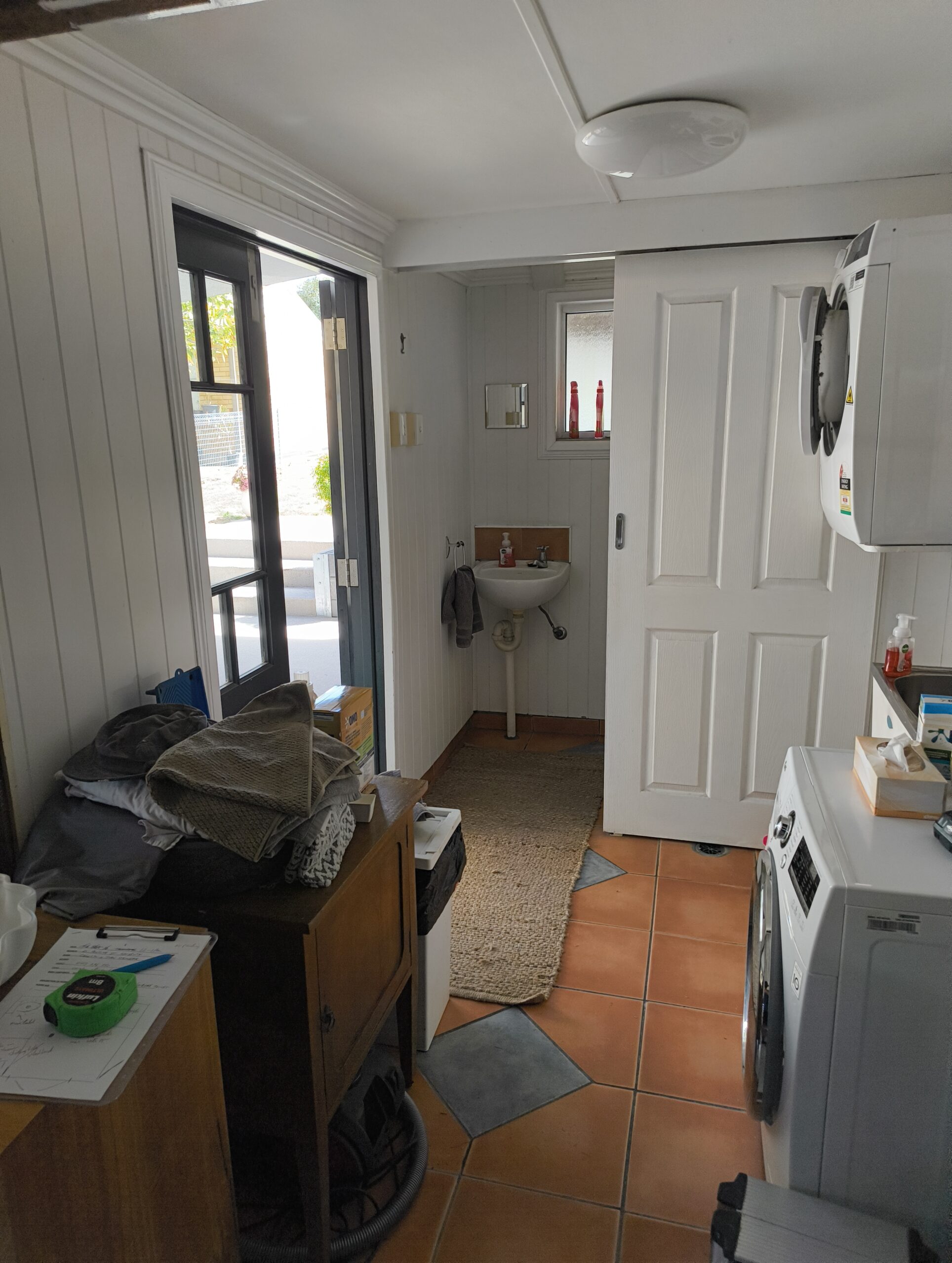 Salisbury laundry before conversion with dated finishes