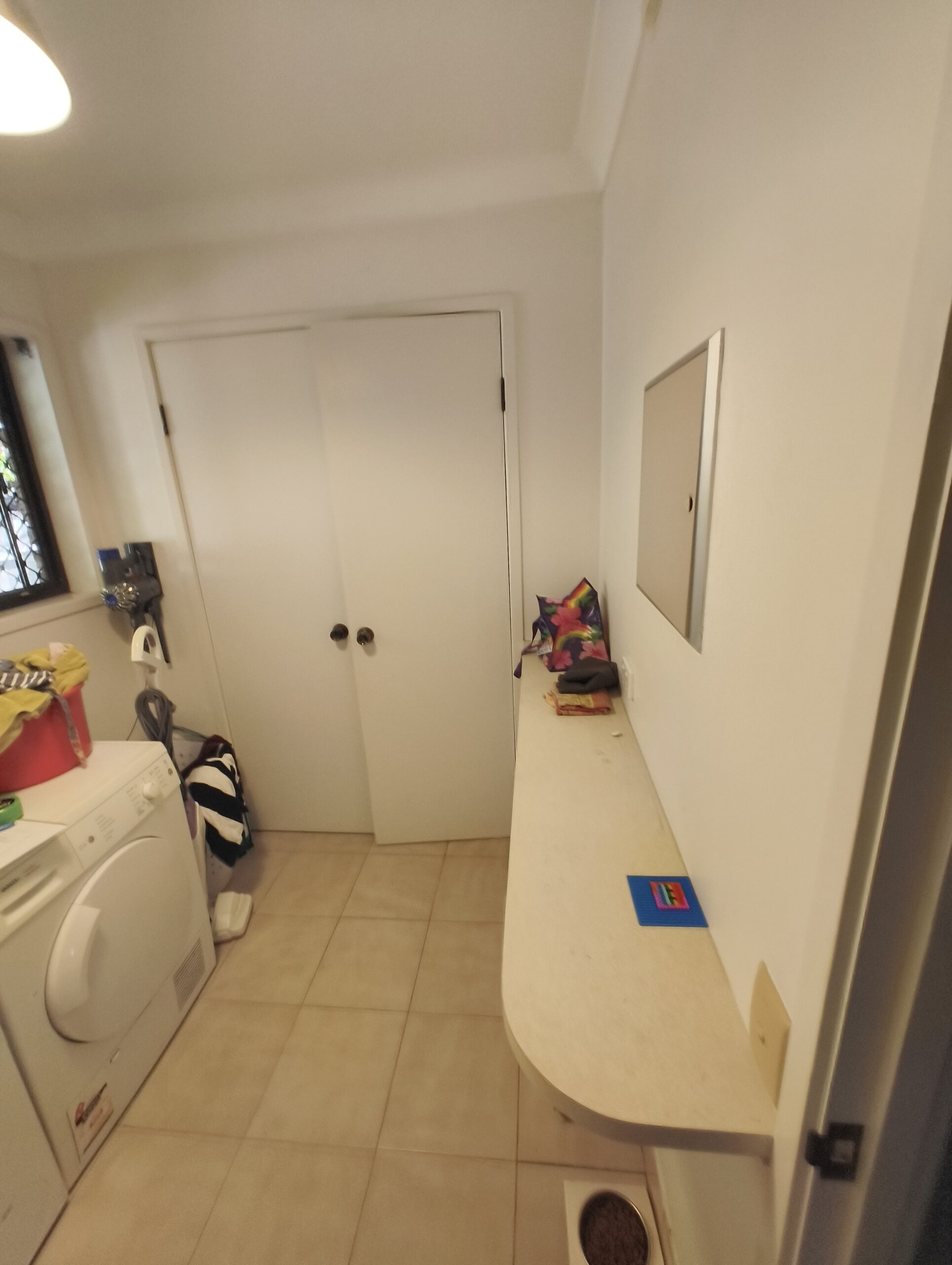 Eight Mile Plains bathroom before renovation showing original floor and wall tile finish