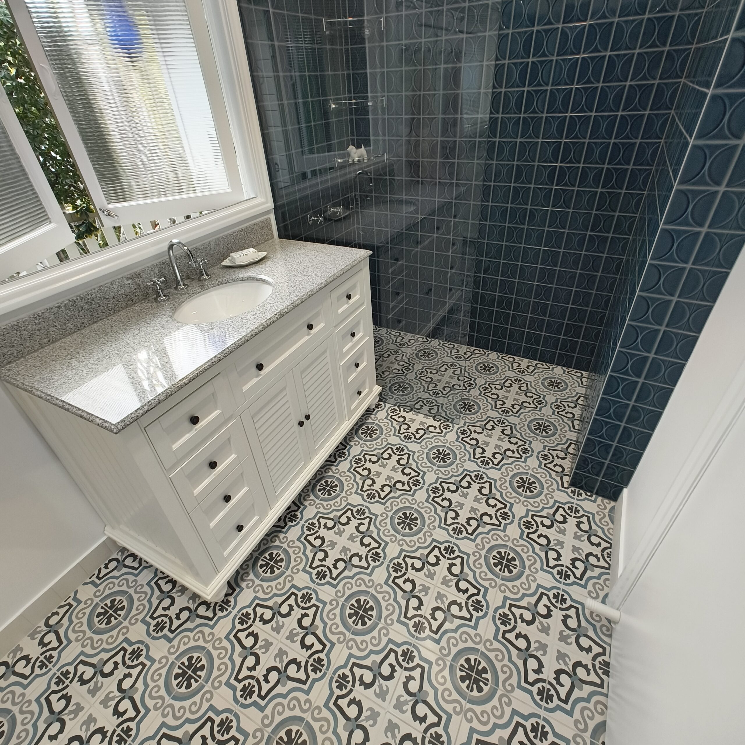 Graceville Queenslander bathroom renovation showing the Italian mosaic floor tiles and walk-in shower