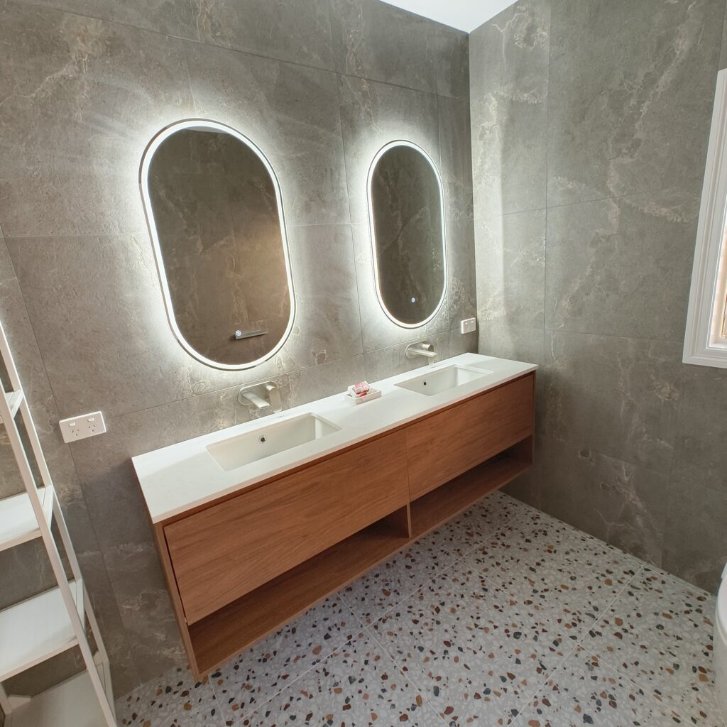 East Brisbane ensuite renovation with Timberline Baltimore 1800 double vanity in Florentine Walnut and twin LED pill mirrors