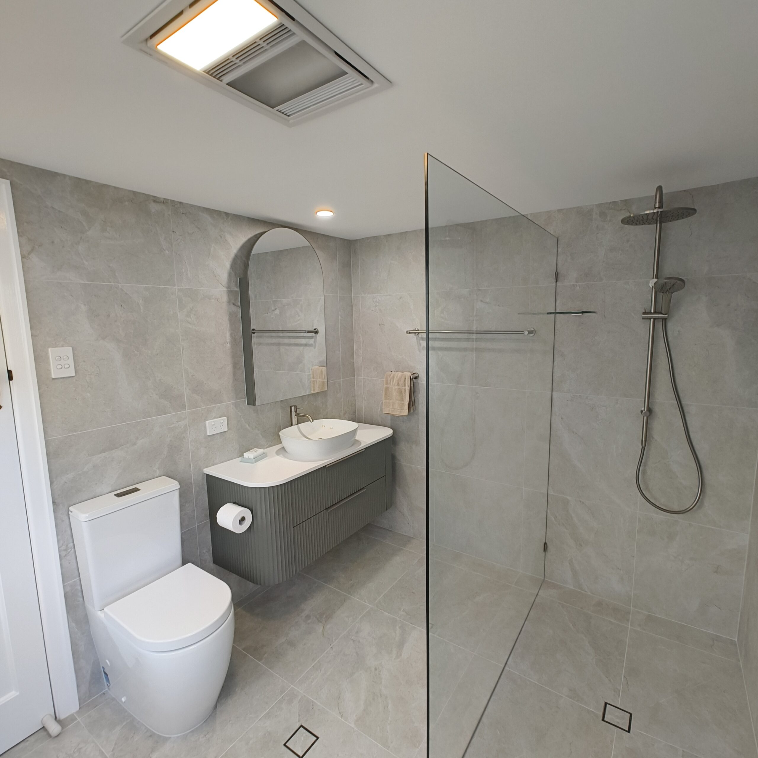 Walk-in shower and Church Topiary green vanity in the renovated Woolloongabba ensuite