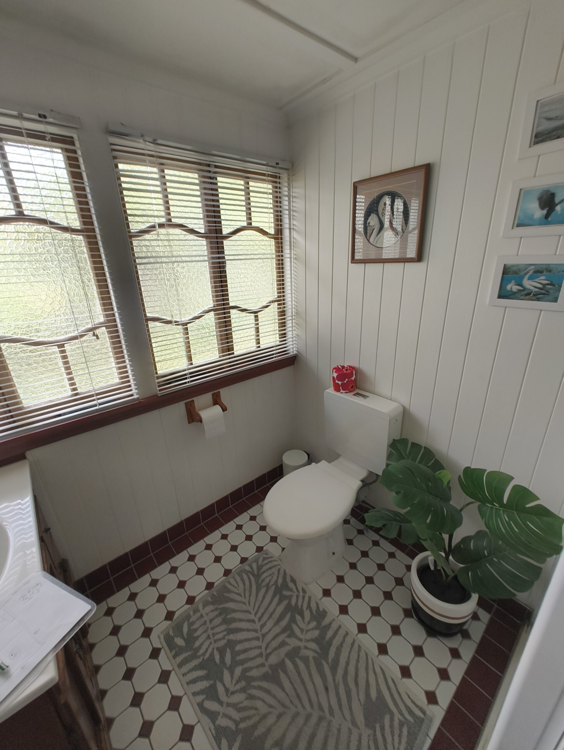 Main bathroom before renovation in the Woolloongabba Queenslander with VJ walls and casement windows