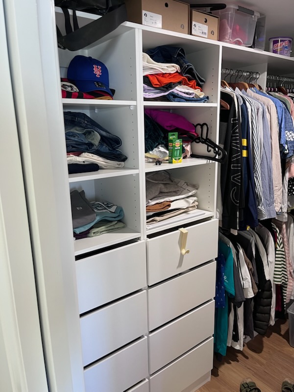 New white melamine shelving and drawers in the renovated Woolloongabba walk-in robe