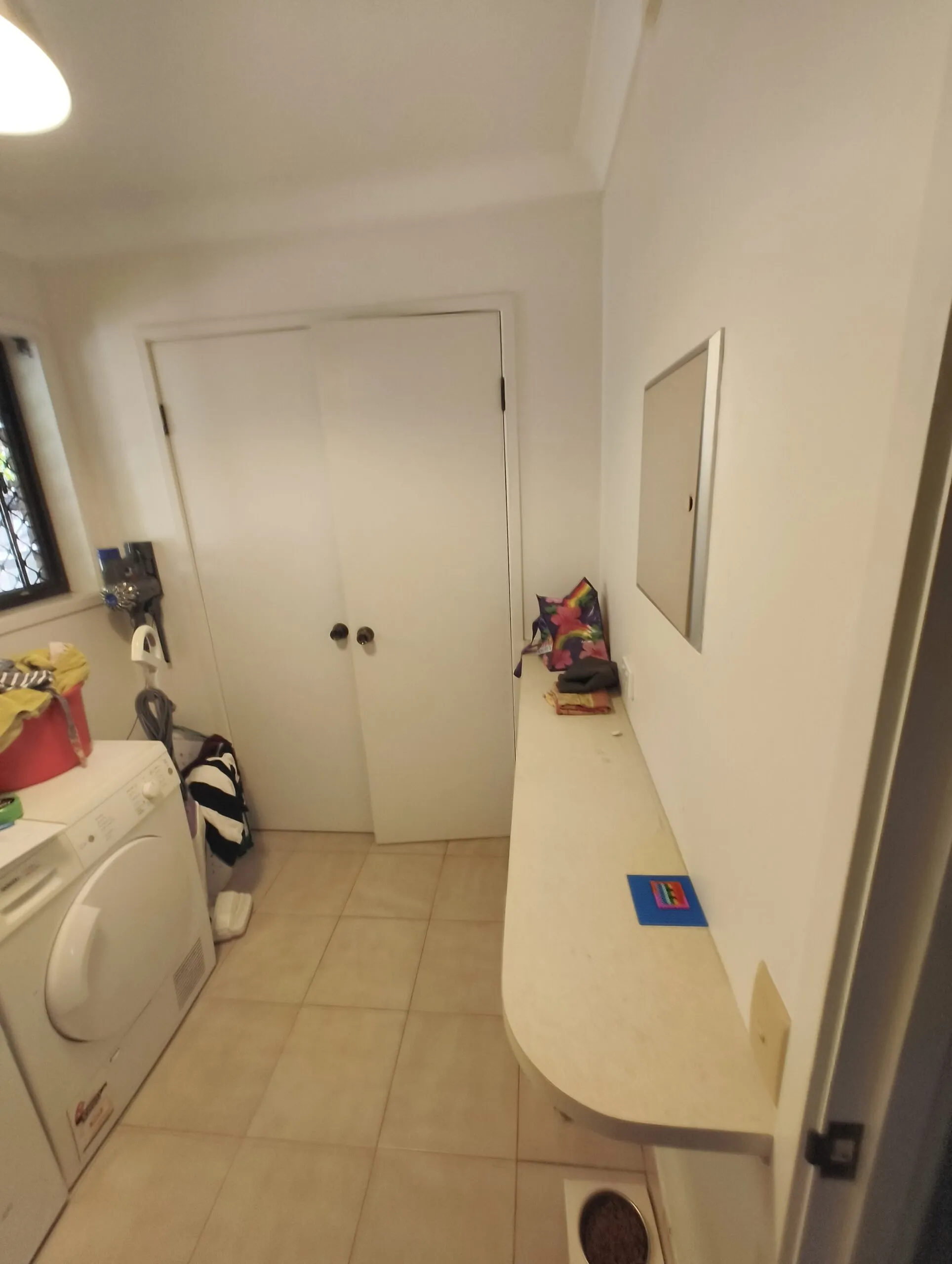 Eight Mile Plains bathroom before renovation showing original floor and wall tile finish