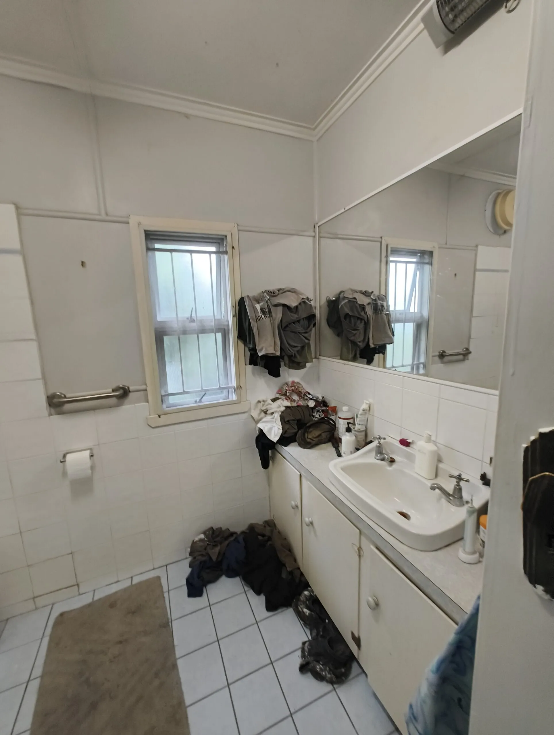 Norman Park bathroom before accessible renovation showing original layout