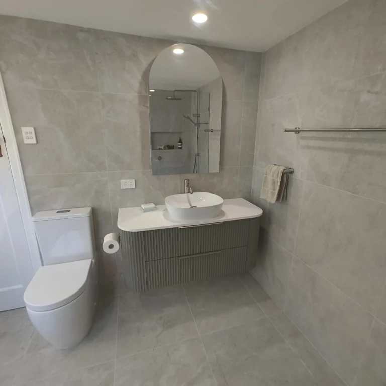 Woolloongabba ensuite renovation with Marquis Shore 1200 vanity in Topiary green and Church arch mirror cabinet
