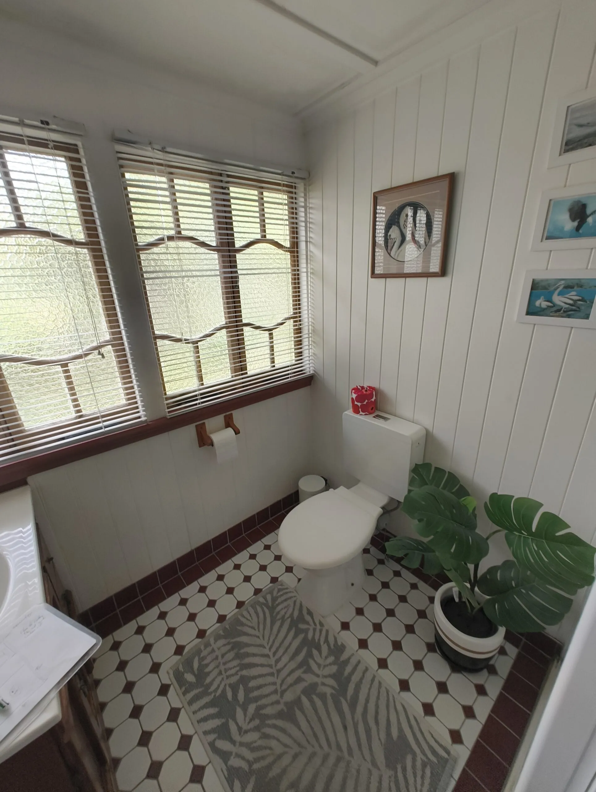 Main bathroom before renovation in the Woolloongabba Queenslander with VJ walls and casement windows
