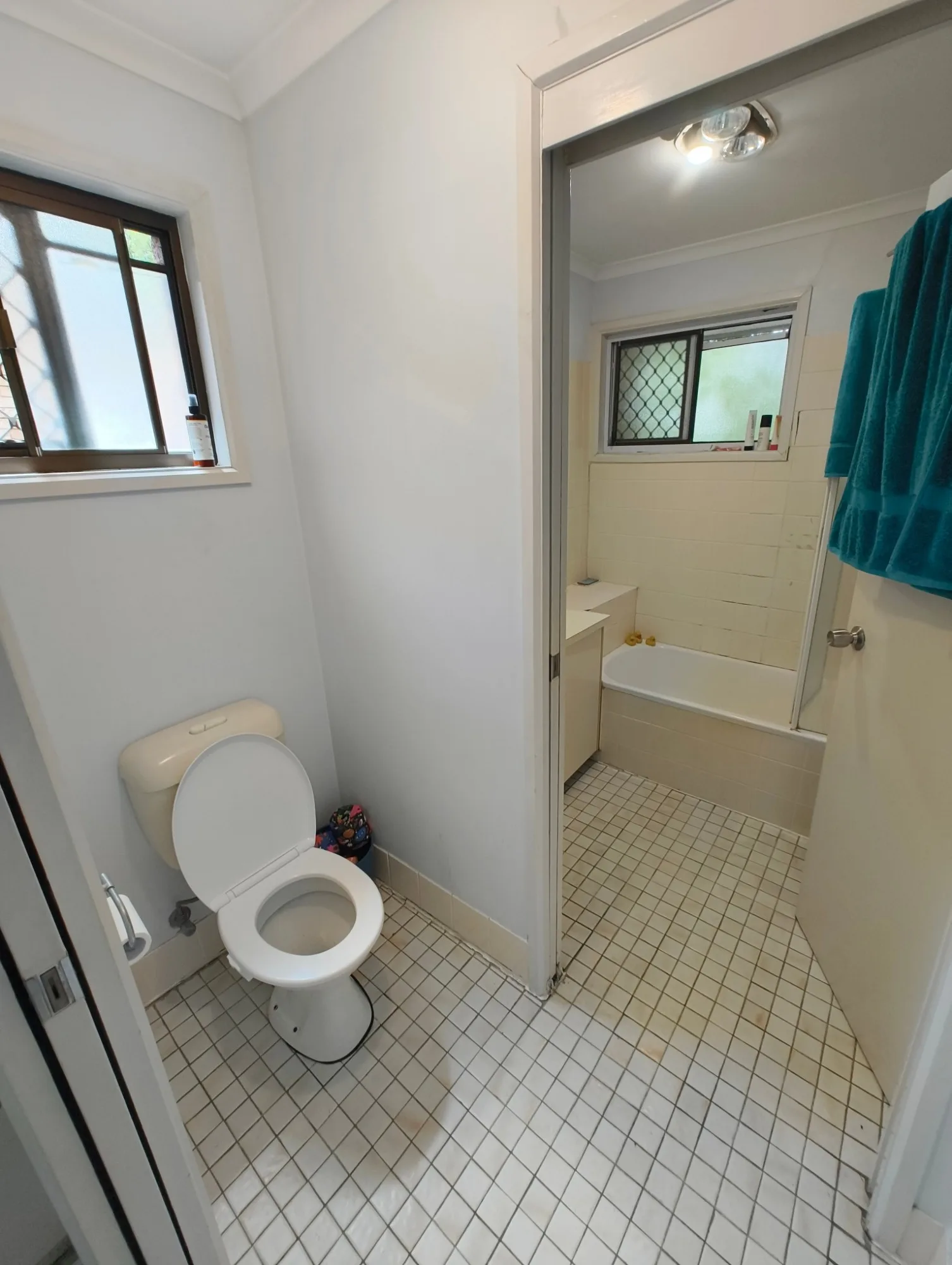 Original toilet room in the Red Hill townhouse before renovation